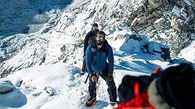 Ex-Royal Marine takes on Everest in climactic end to world’s longest climb in history