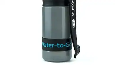 Water bottle with strap for outdoor activities and hydration on the go.