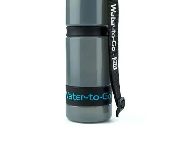 Water bottle with strap for outdoor activities and hydration on the go.