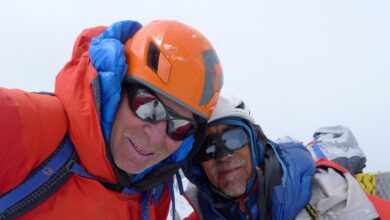 A couple of men wearing helmets and goggles AI-generated content may be incorrect.