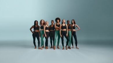 A group of women in black tops and green pants AI-generated content may be incorrect.