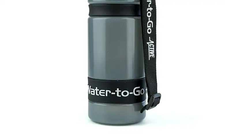 Water bottle with strap - ideal for outdoor activities and hiking. Stylish, durable, and portable for all adventures.