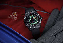 Shock-resistant outdoor tactical watch with luminous dial and rotating bezel.