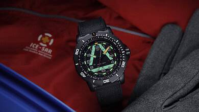 Shock-resistant outdoor tactical watch with luminous dial and rotating bezel.