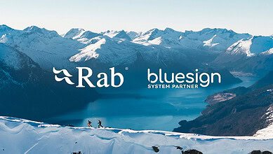 Snow-capped mountains with hikers in alpine landscape, outdoors adventure, mountain trekking, scenic wilderness.