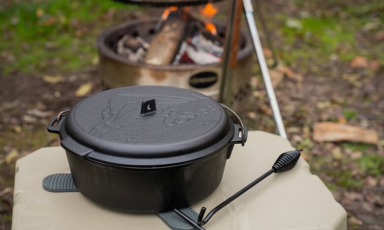 Outdoor Insight cast iron cooking pot for camping and outdoor adventures.