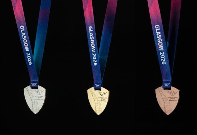 High-quality medals from Glasgow 2026 Winter Sports event with colourful ribbons and metallic finish.
