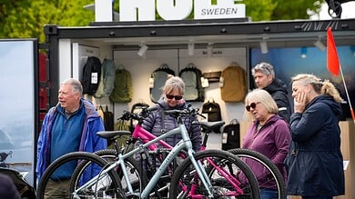 Durable outdoor backpacks and cycling gear displayed at Thule Sweden booth.