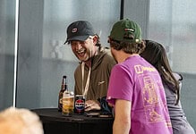 A comfortable social gathering with friends enjoying drinks indoors.