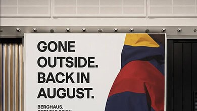 Outdoor Insight Berghaus store opening soon banner at shopping centre.