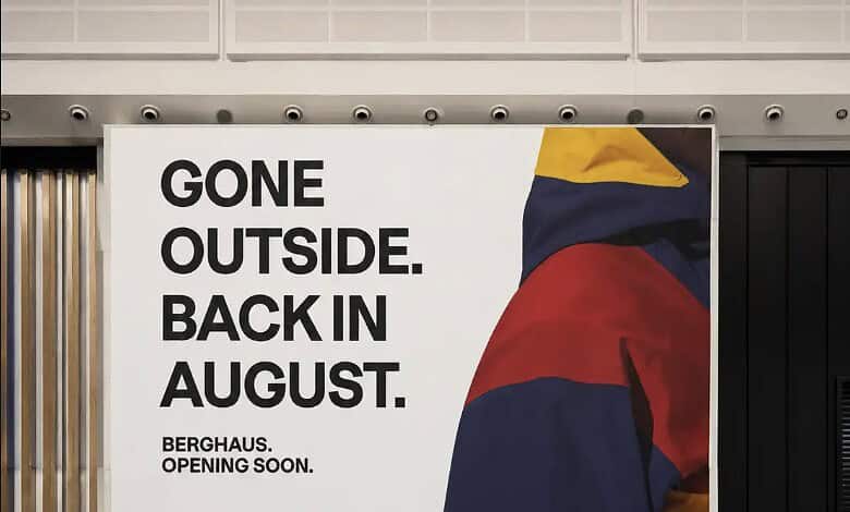 Outdoor Insight Berghaus store opening soon banner at shopping centre.