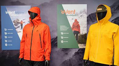 Colorful waterproof jackets for outdoor activities on mannequins.