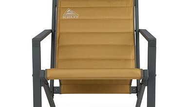 Kelty outdoor camping chair with beige fabric and black frame.